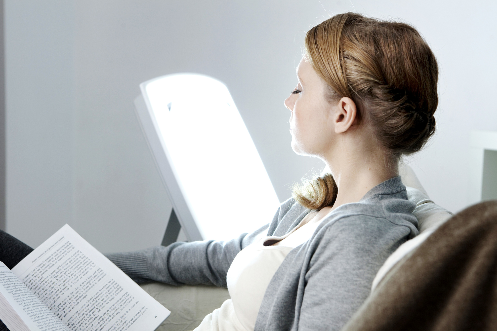 Person Reading Using a Soft Light